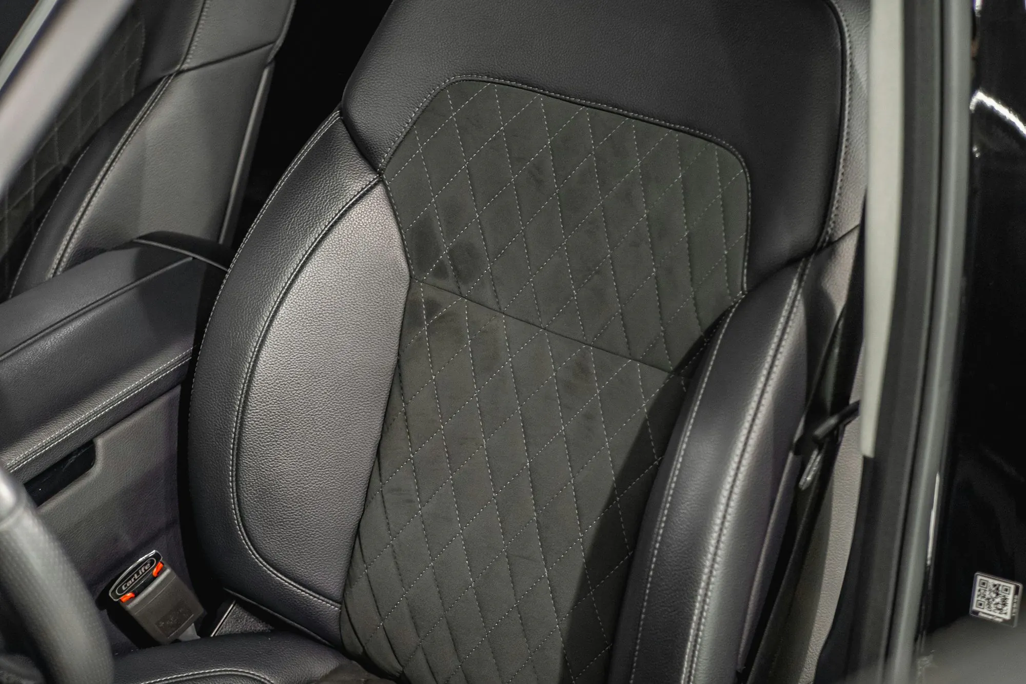 Clean black leather car seat